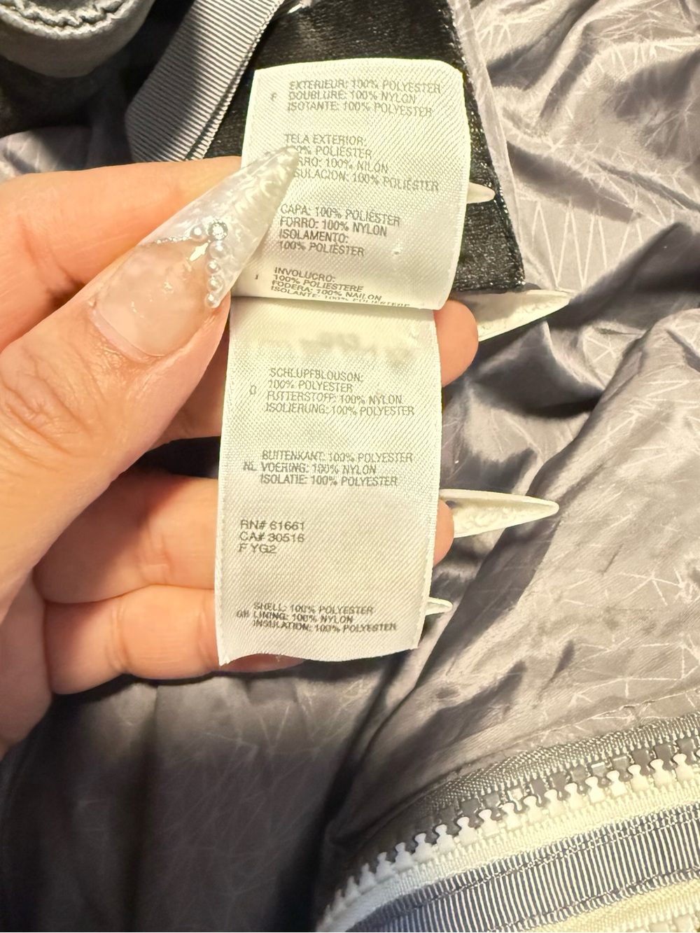 This is a The North Face Hyvent 3-in-1 insulated snow jacket in a white, orange - Picture 14 of 16